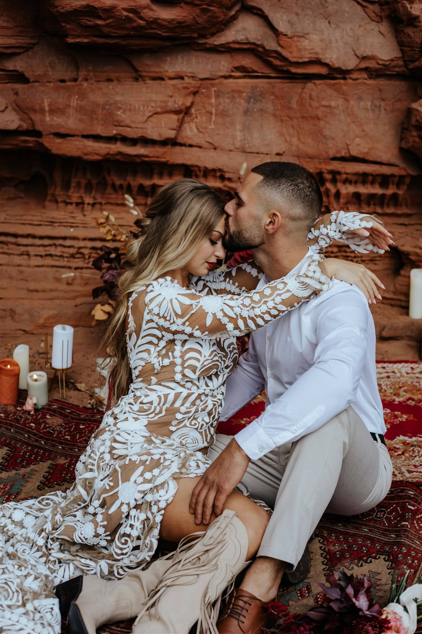 Intimate elopement couple sitting closely together