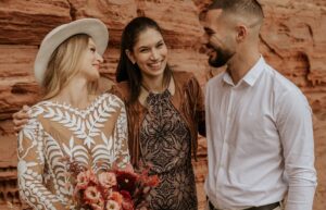wedding planner enjoying a joyful moment with wedding couple